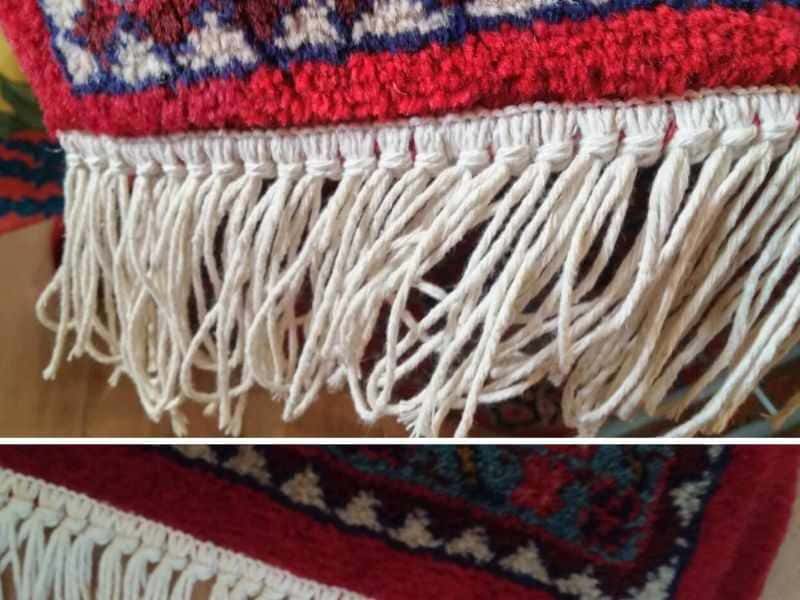 Detalj rojti tepiha nakon opšivanja, dva ugla